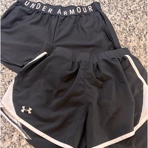 2 pair of Black Under Armour shorts, women’s size M